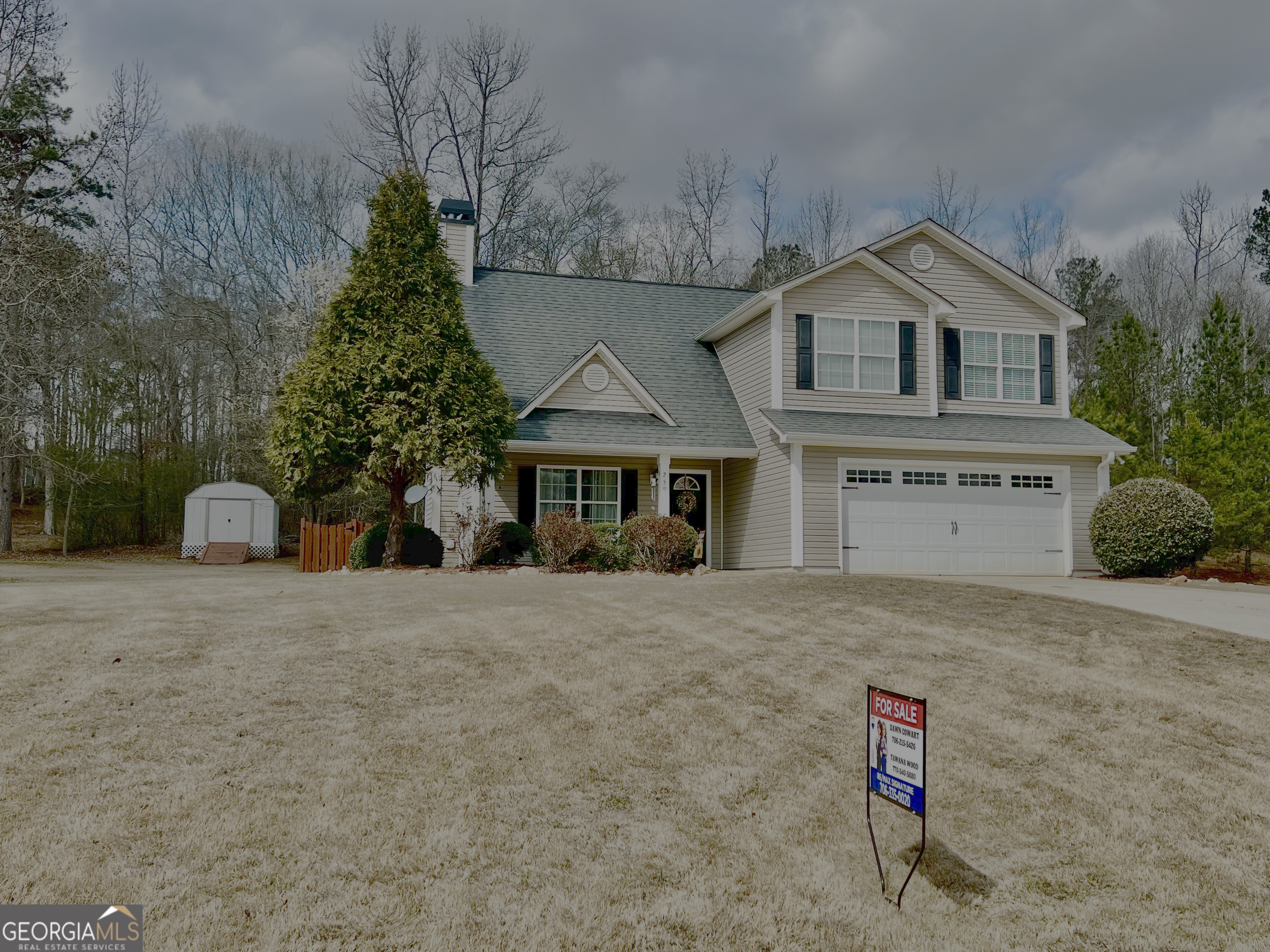 259 Watson Drive Hull, GA 30646 - Photo 3 of 47 a front view of a house with a yard