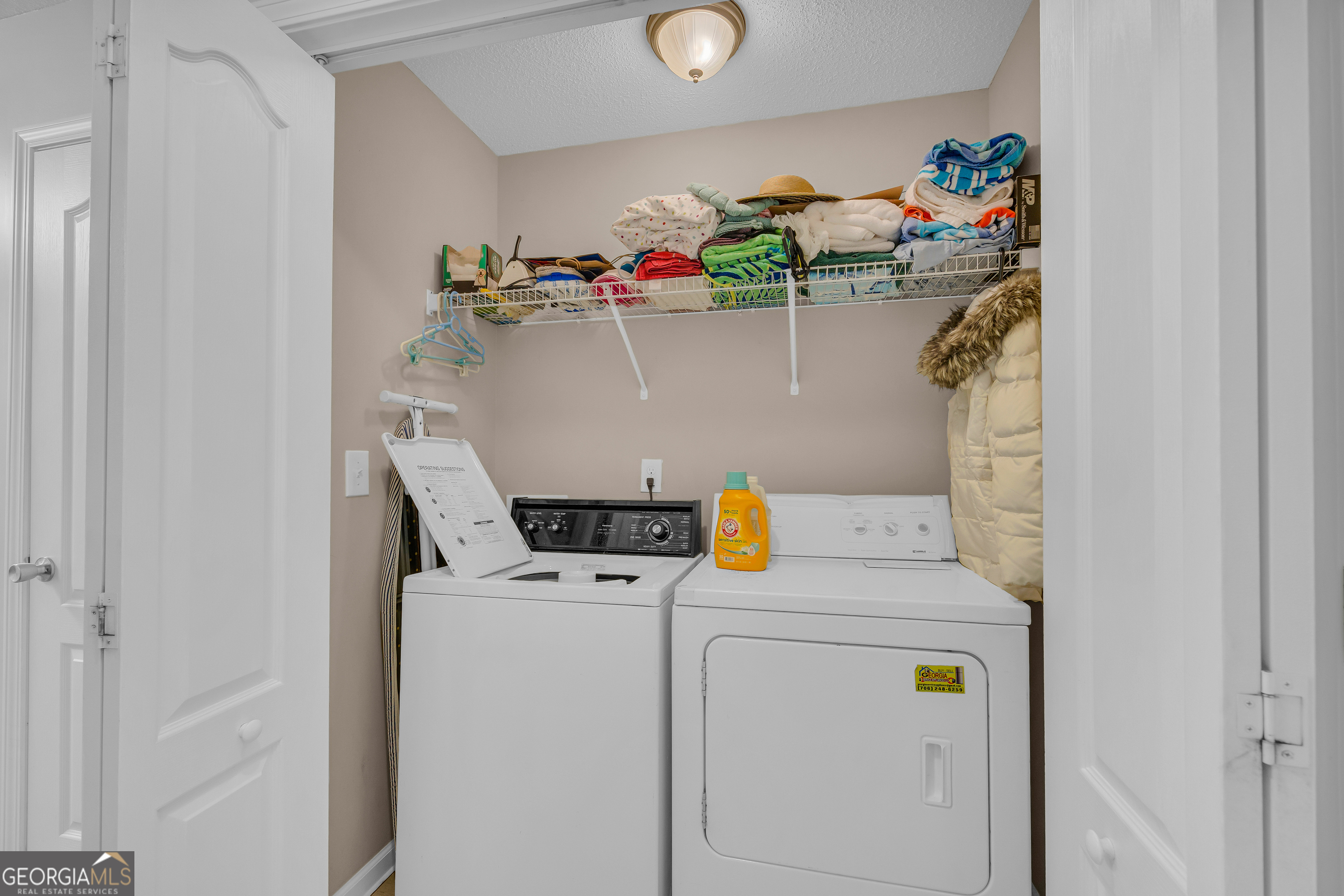259 Watson Drive Hull, GA 30646 - Photo 31 of 47 a utility room with dryer and washer