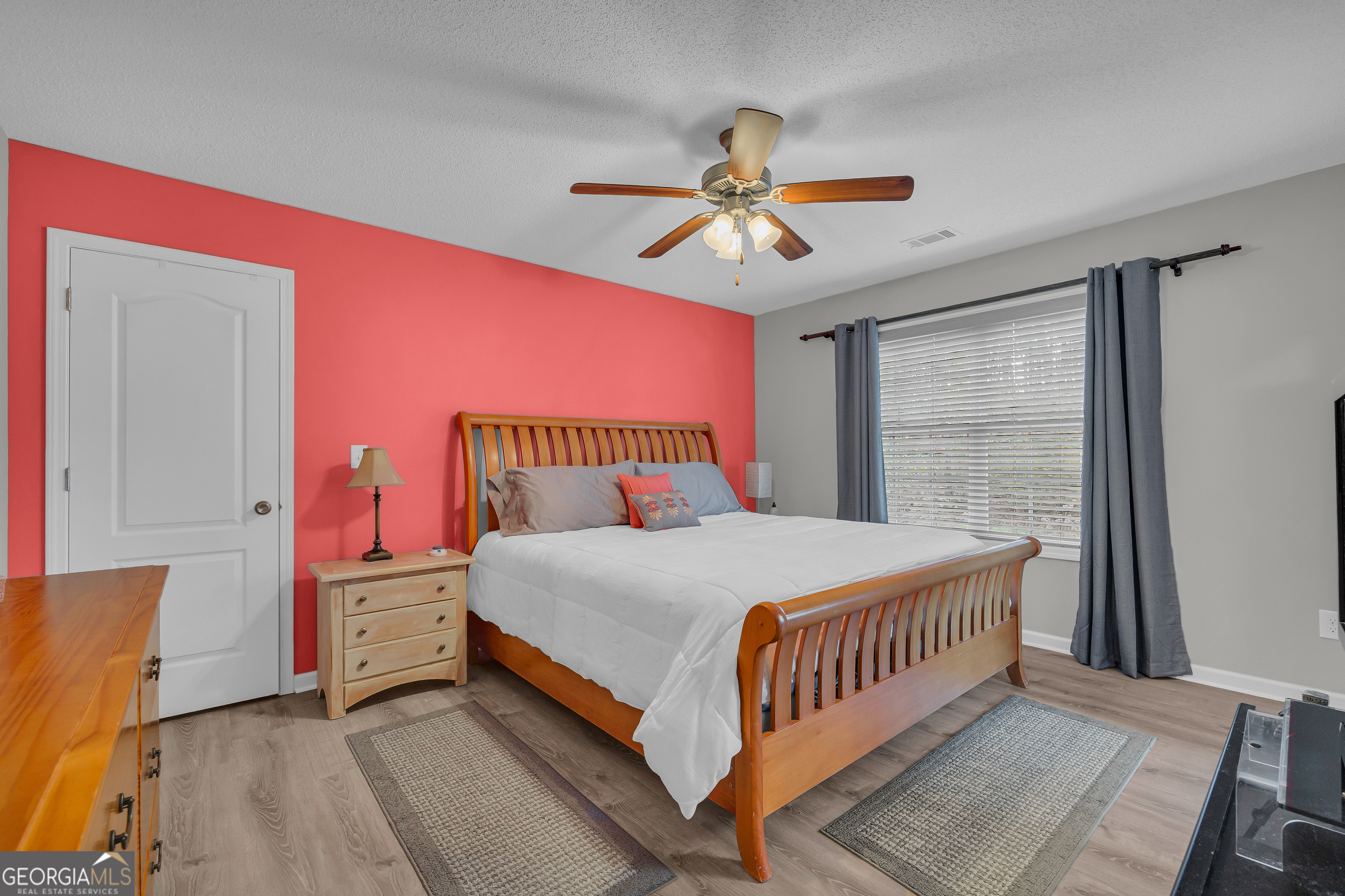 259 Watson Drive Hull, GA 30646 - Photo 36 of 47 a bedroom with a bed and window