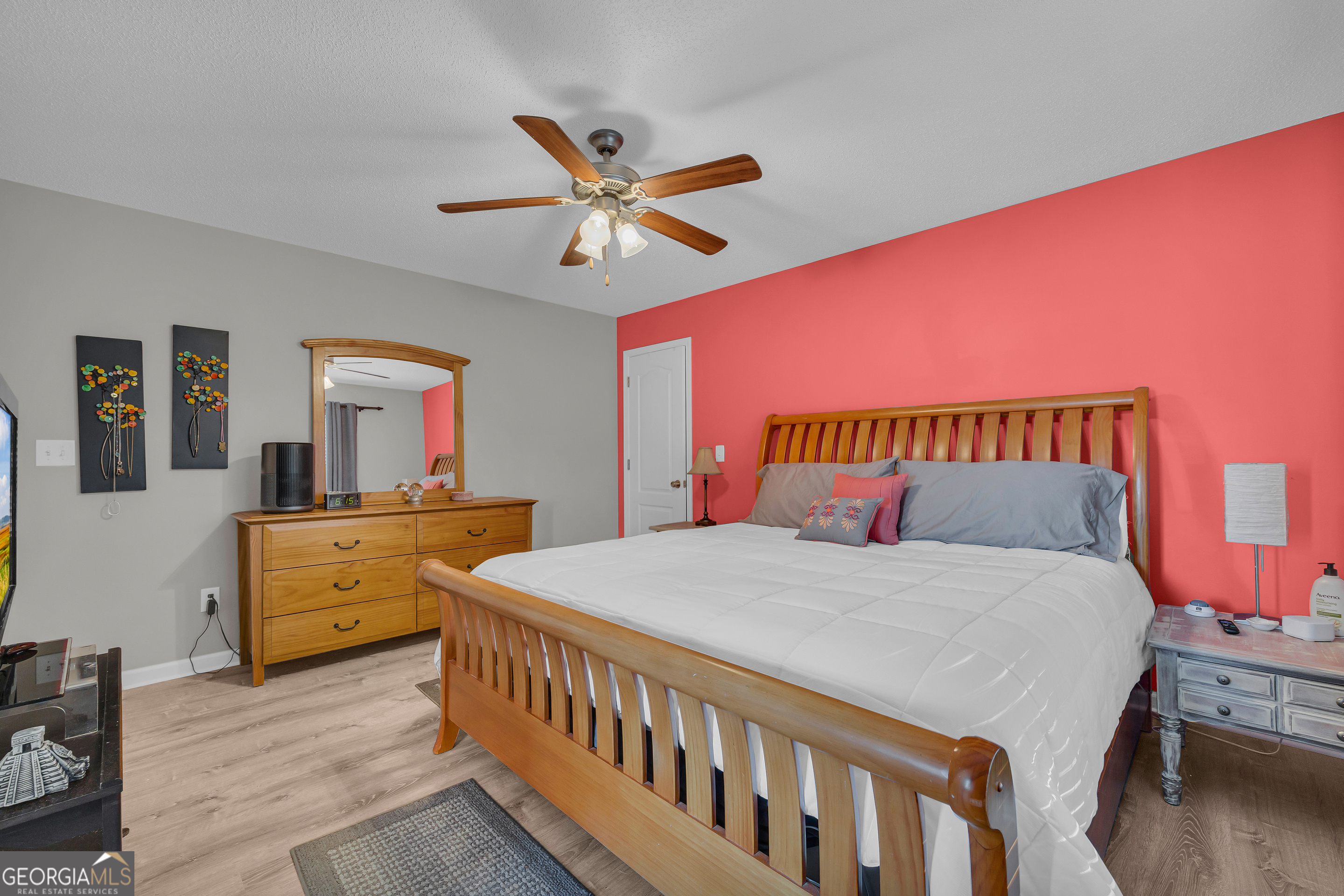 259 Watson Drive Hull, GA 30646 - Photo 37 of 47 a bedroom with a bed and a dresser