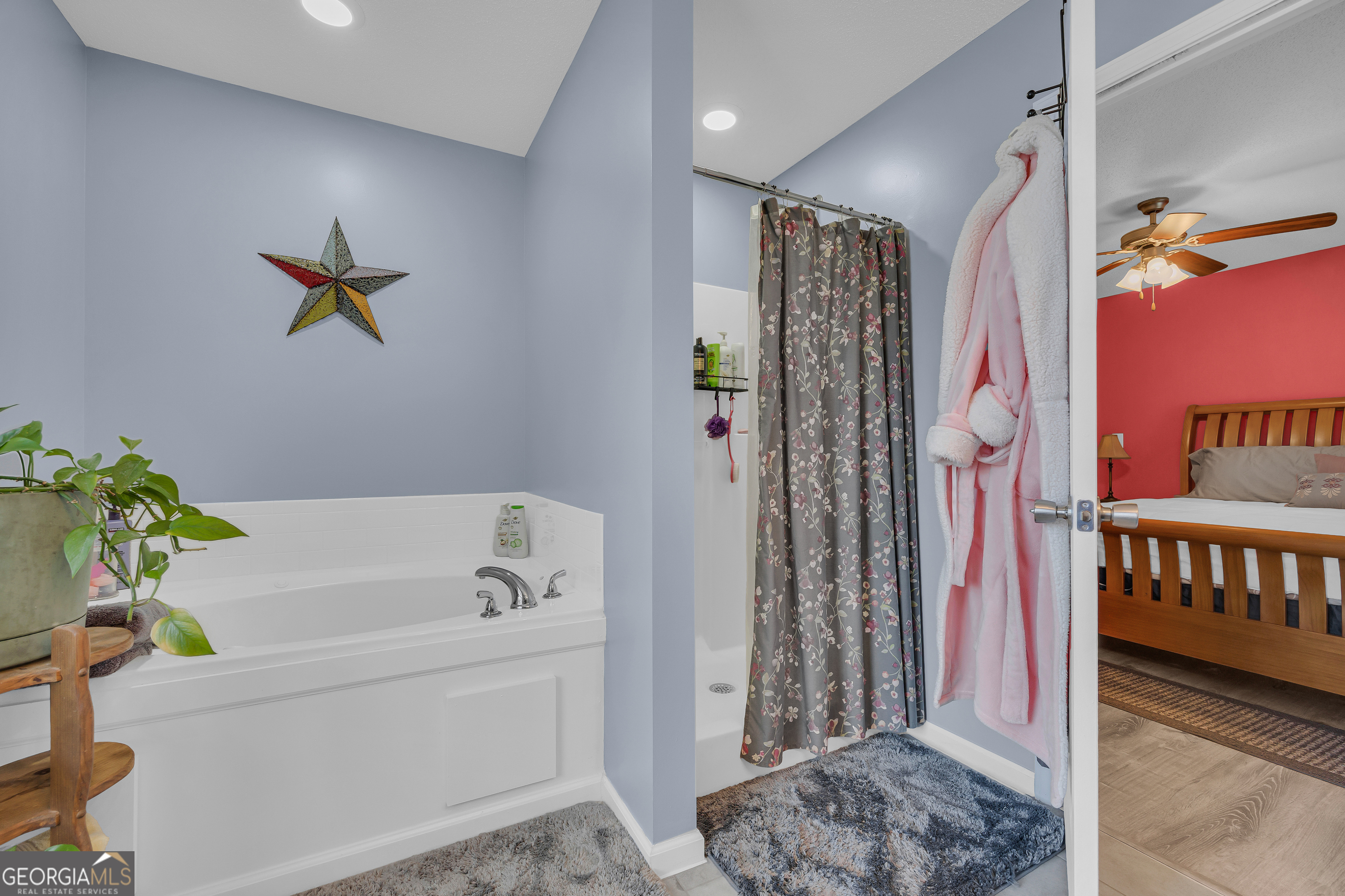 259 Watson Drive Hull, GA 30646 - Photo 39 of 47 a bathroom with a bathtub and a shower