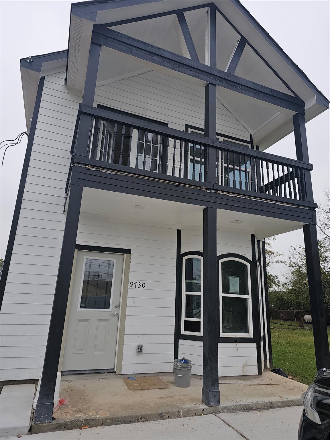 a front view of a house with a porch