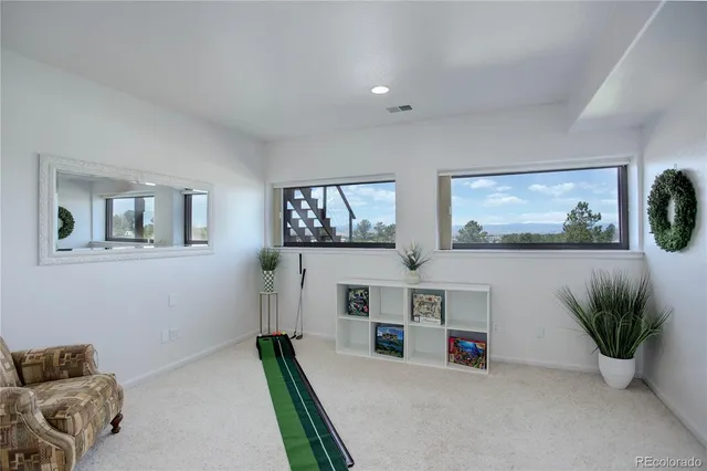 a view of kitchen with furniture and wooden floor