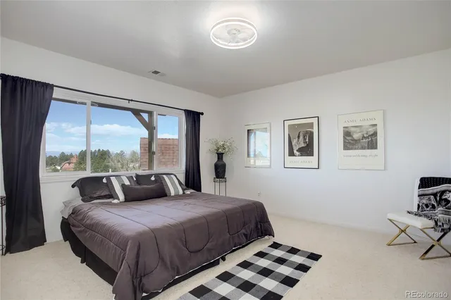 a view of livingroom with furniture and window
