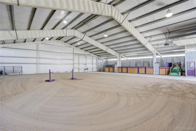 an aerial view of a house with a garden