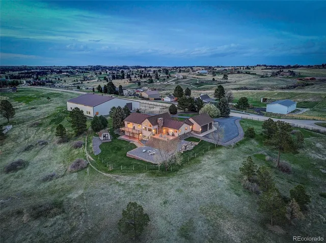 a kitchen with white cabinets sink and appliances