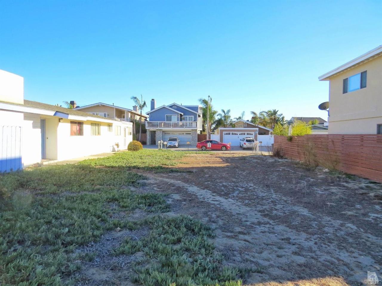 Seabreeze Oxnard, CA 93035 - Photo 1 of 9 a view of a house with a yard and sitting area