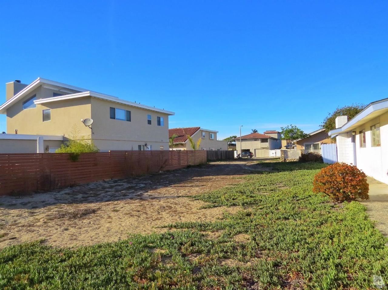 Seabreeze Oxnard, CA 93035 - Photo 2 of 9 a view of a house with a yard