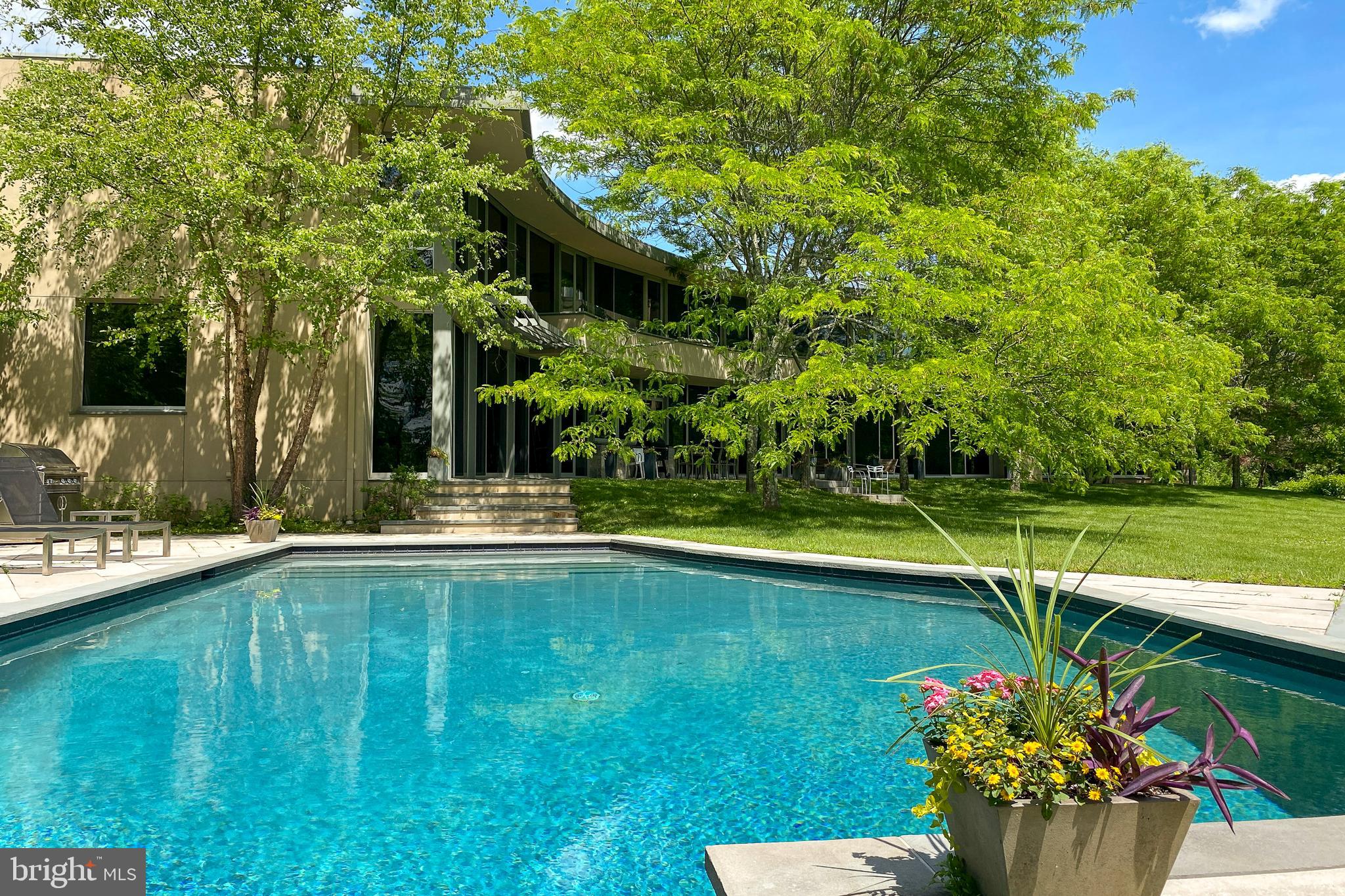 4750 Province Line Road Princeton, NJ 08540 - Photo 45 of 50 a view of a house with a swimming pool
