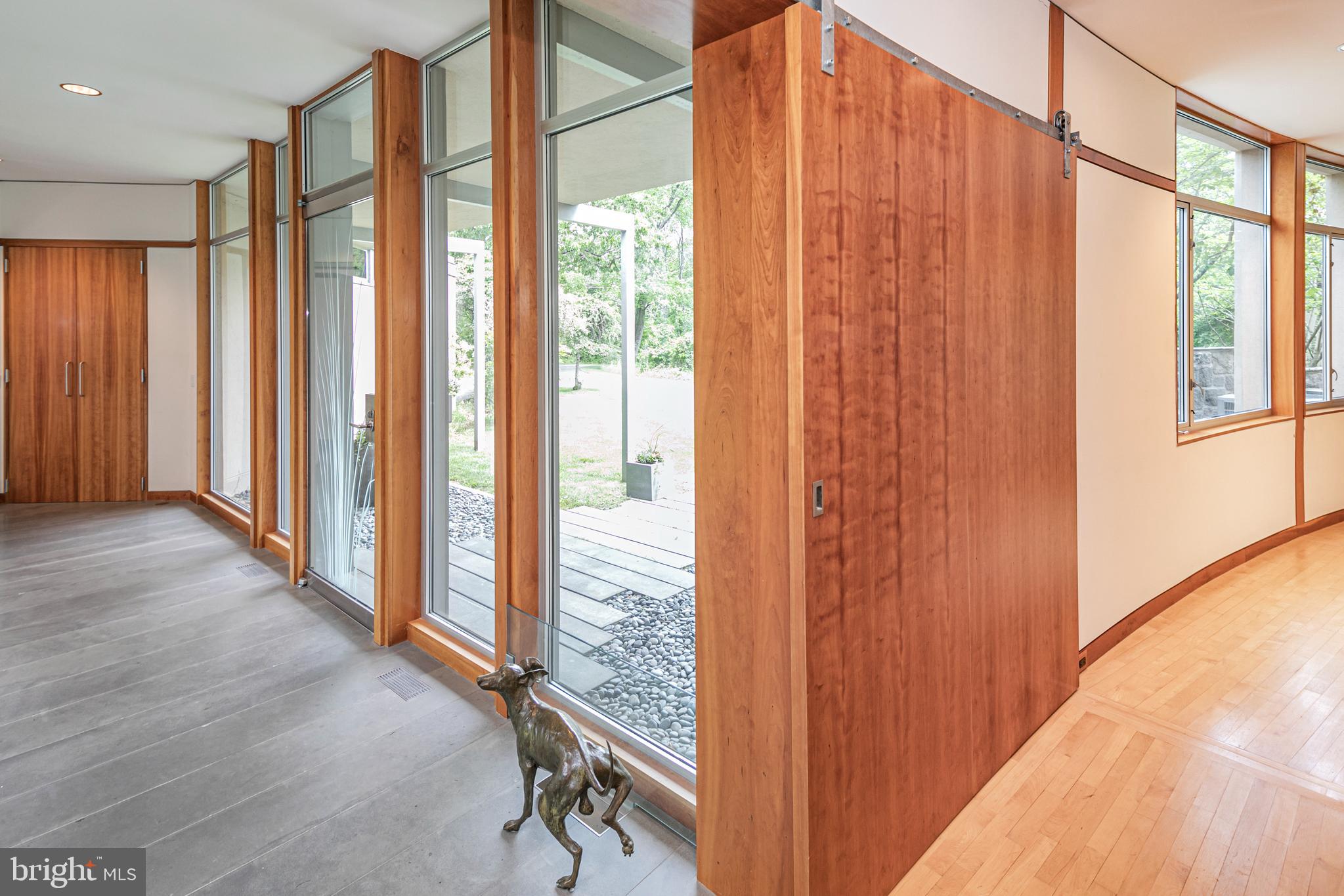 4750 Province Line Road Princeton, NJ 08540 - Photo 7 of 50 a view of a balcony with wooden floor and windows
