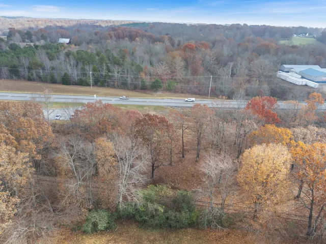 a view of a road with a yard