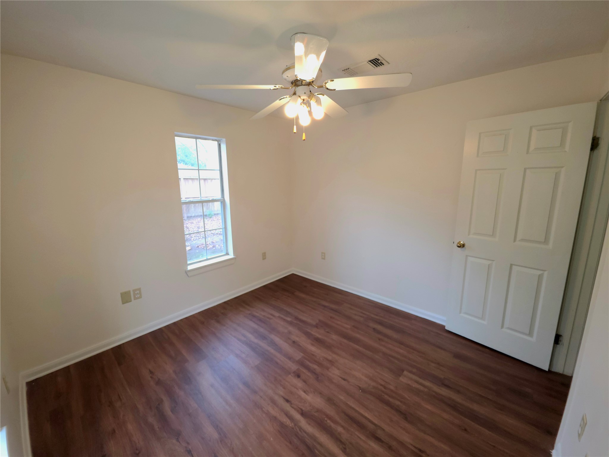 418 Texas Street Tomball, TX 77375 - Photo 11 of 23 This space features a secondary bedroom.