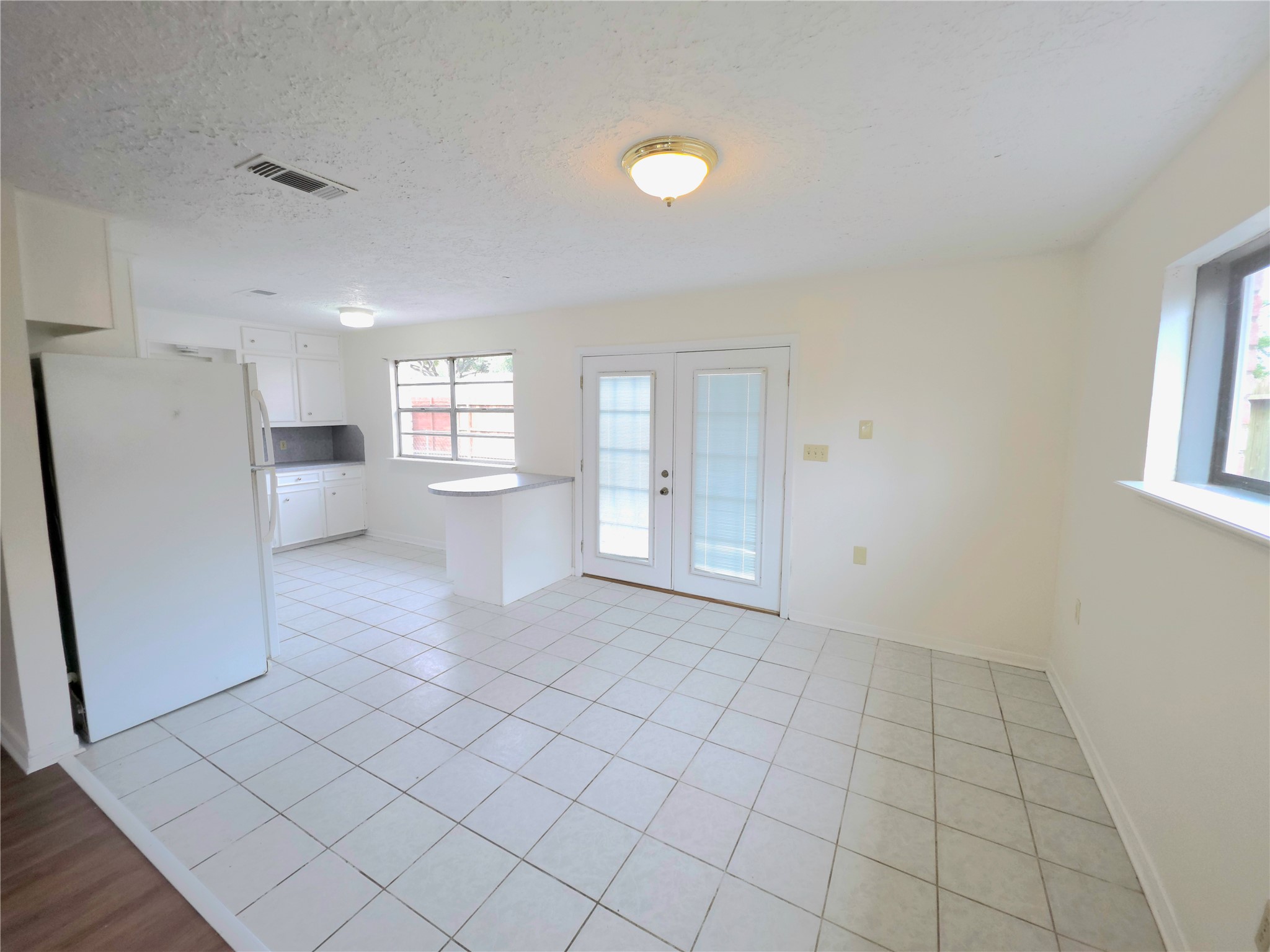 418 Texas Street Tomball, TX 77375 - Photo 17 of 23 This space features the dining room.