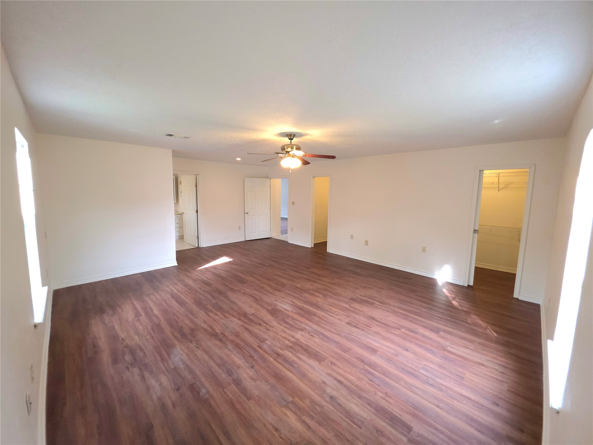 418 Texas Street Tomball, TX 77375 - Photo 6 of 23 This space features the primary bedroom.