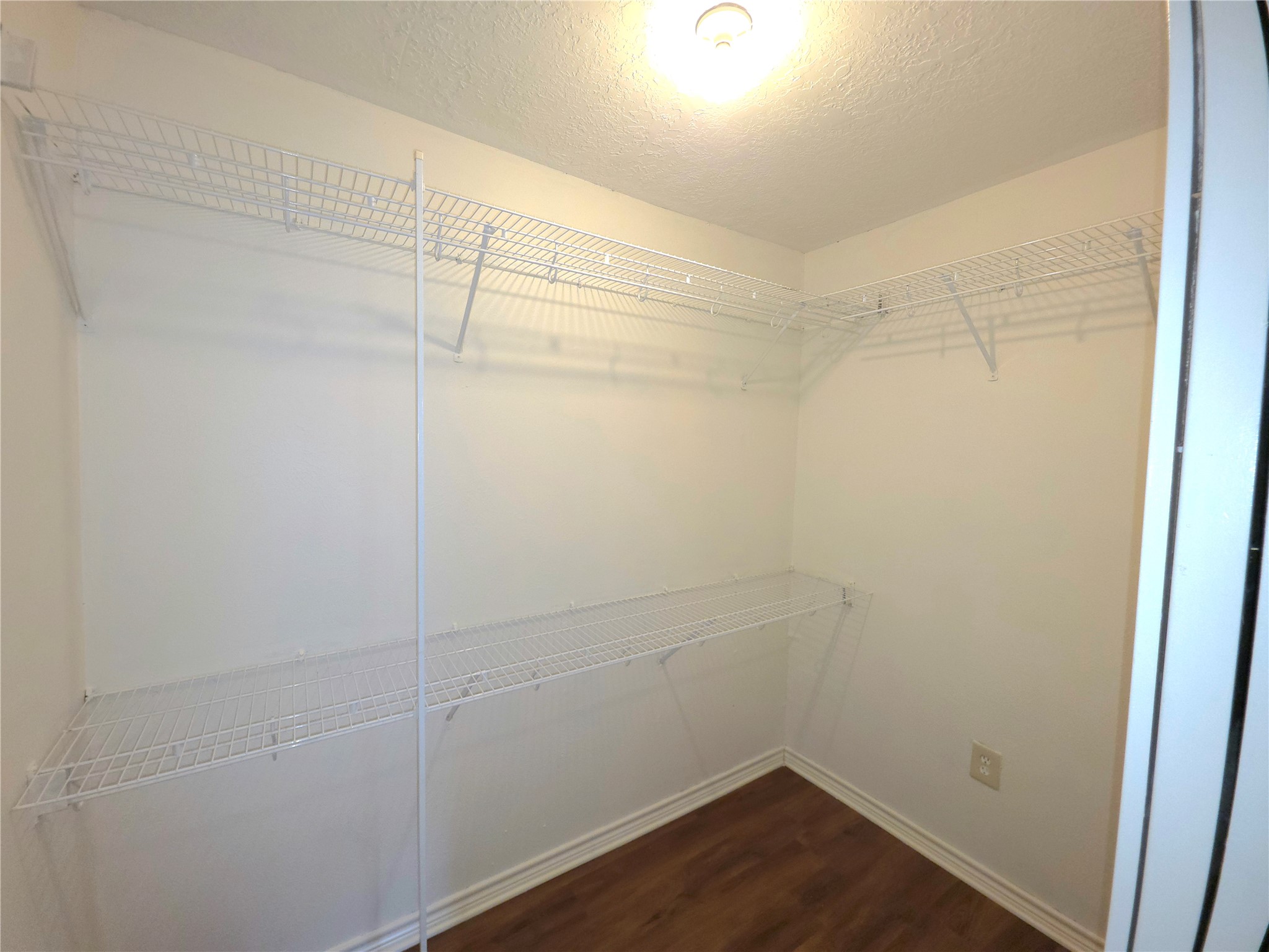 418 Texas Street Tomball, TX 77375 - Photo 7 of 23 Primary bedroom 1st closet.