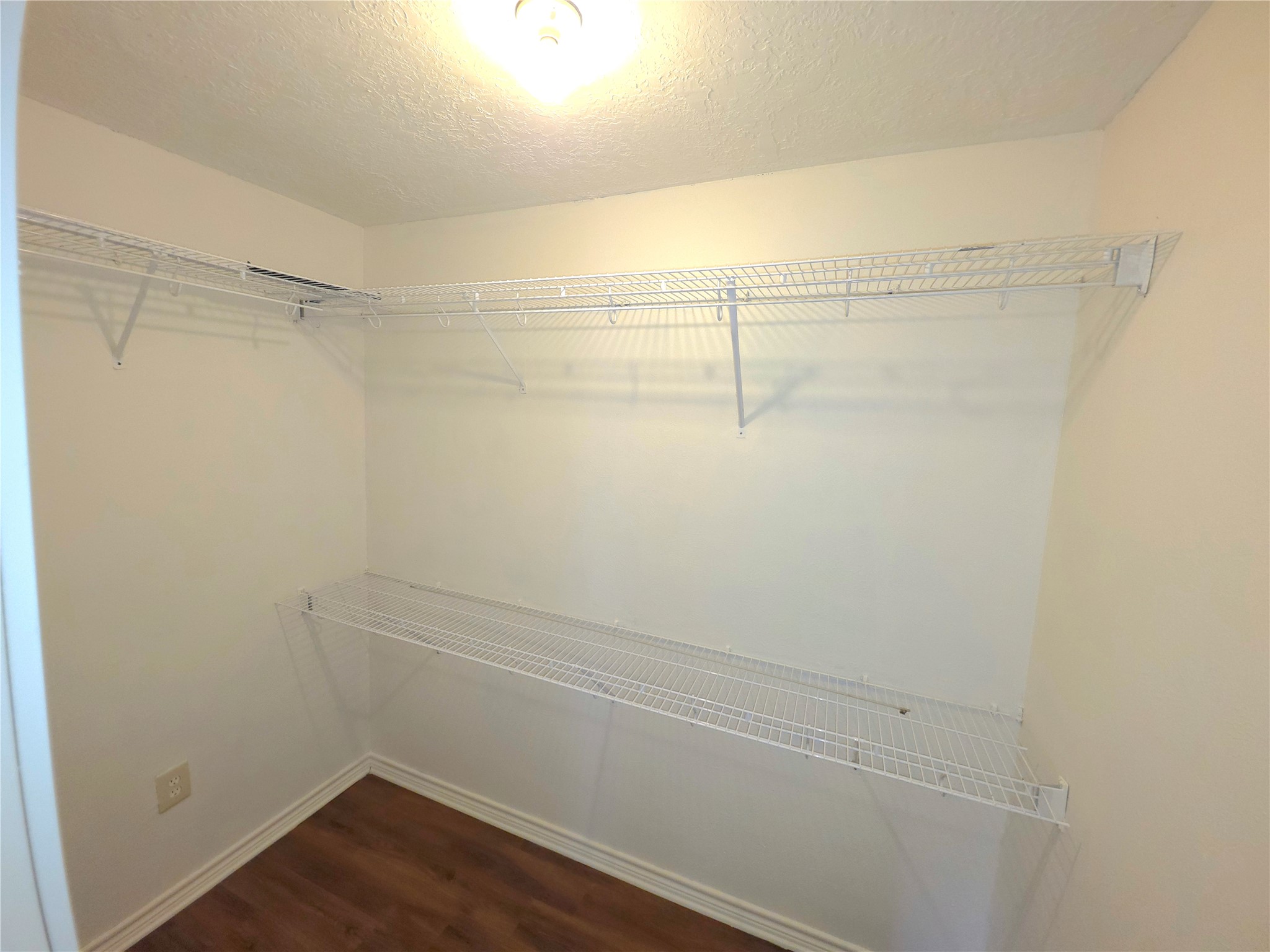 418 Texas Street Tomball, TX 77375 - Photo 8 of 23 Primary bedroom 2nd closet.