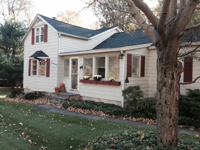 14 Silver Spring Park Road Ridgefield, CT 06877 - Photo 1 of 1 a front view of a house with a yard