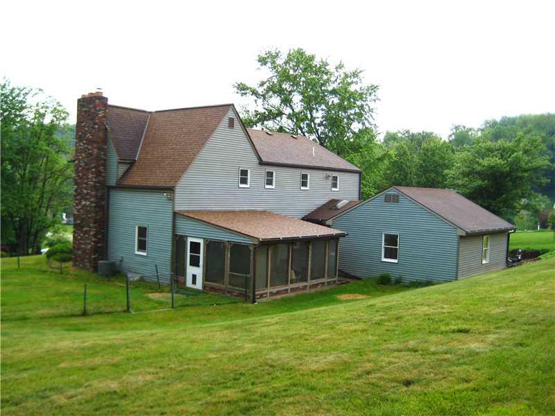 540 McCombs Road Venetia, PA 15367 - Photo 2 of 25 Exterior Back. Relax on the enclosed back porch with new ceiling and roof.