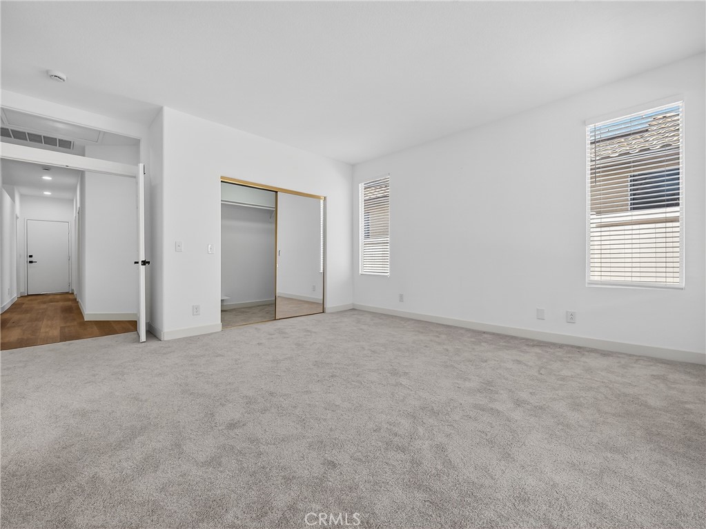 1436 Riviera Avenue Banning, CA 92220 - Photo 30 of 43 a view of an empty room with a window