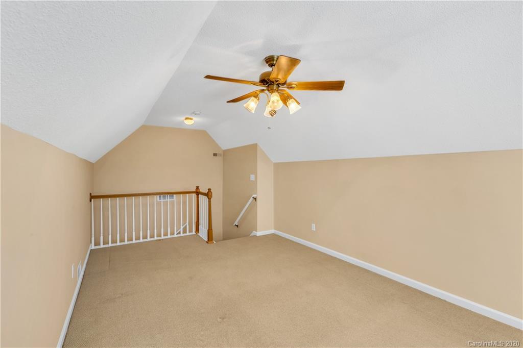 10 Farm Valley Road Fletcher, NC 28732 - Photo 2 of 29 an empty room with windows and fan