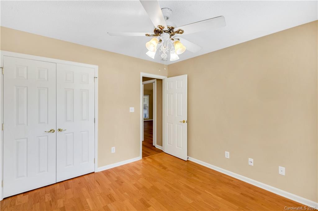 10 Farm Valley Road Fletcher, NC 28732 - Photo 21 of 29 a view of a big room with a chandelier fan