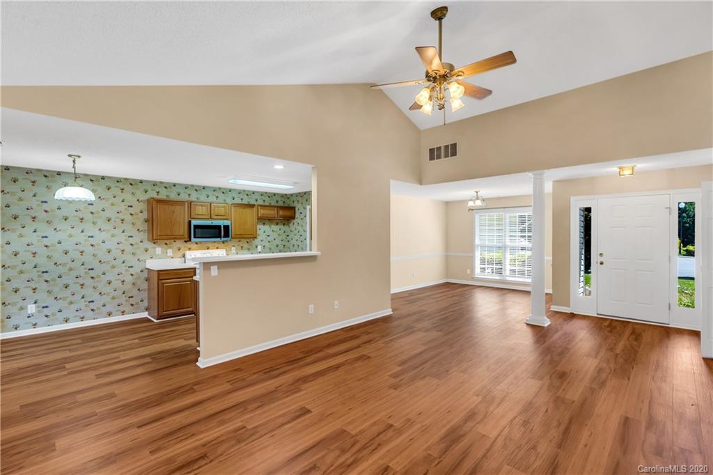 10 Farm Valley Road Fletcher, NC 28732 - Photo 24 of 29 a view of livingroom with hardwood floor and a ceiling fan