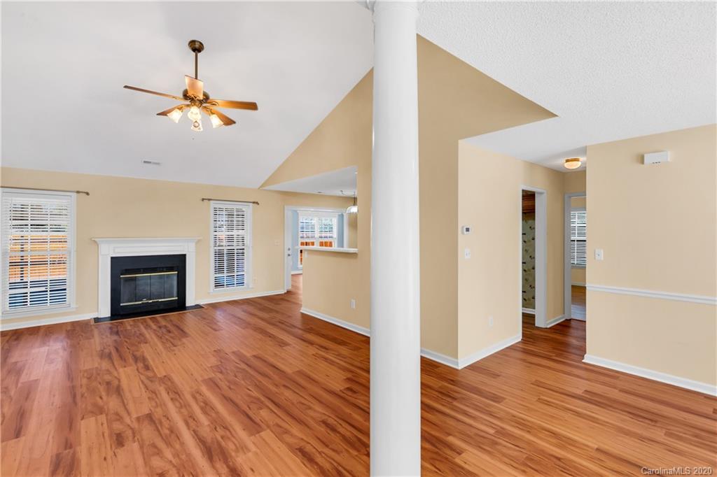 10 Farm Valley Road Fletcher, NC 28732 - Photo 26 of 29 a view of empty room with wooden floor and fireplace