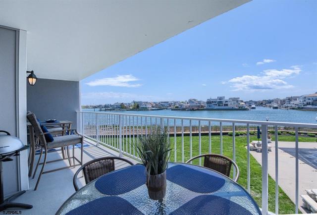 4220 Atlantic Brigantine Boulevard, Unit 203B Brigantine, NJ 08203 - Photo 1 of 22 a view of a balcony with lake view and a potted plant