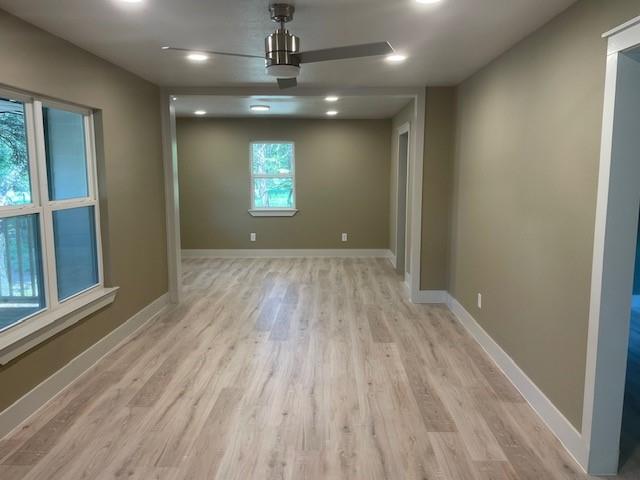 1631 Lcr 760 Groesbeck, TX 76642 - Photo 3 of 15 wooden floor in an empty room with a window