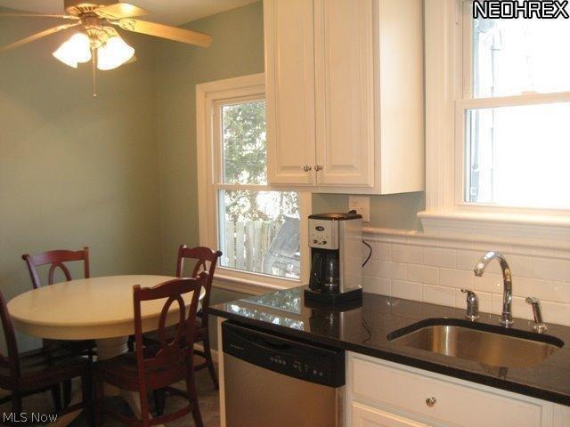 3877 Bushnell Road Cleveland, OH 44118 - Photo 7 of 19 Updated Gourmet Kitchen (2009) Features Granite Countertops, Stainless Steel Appliances and Subway Tile.