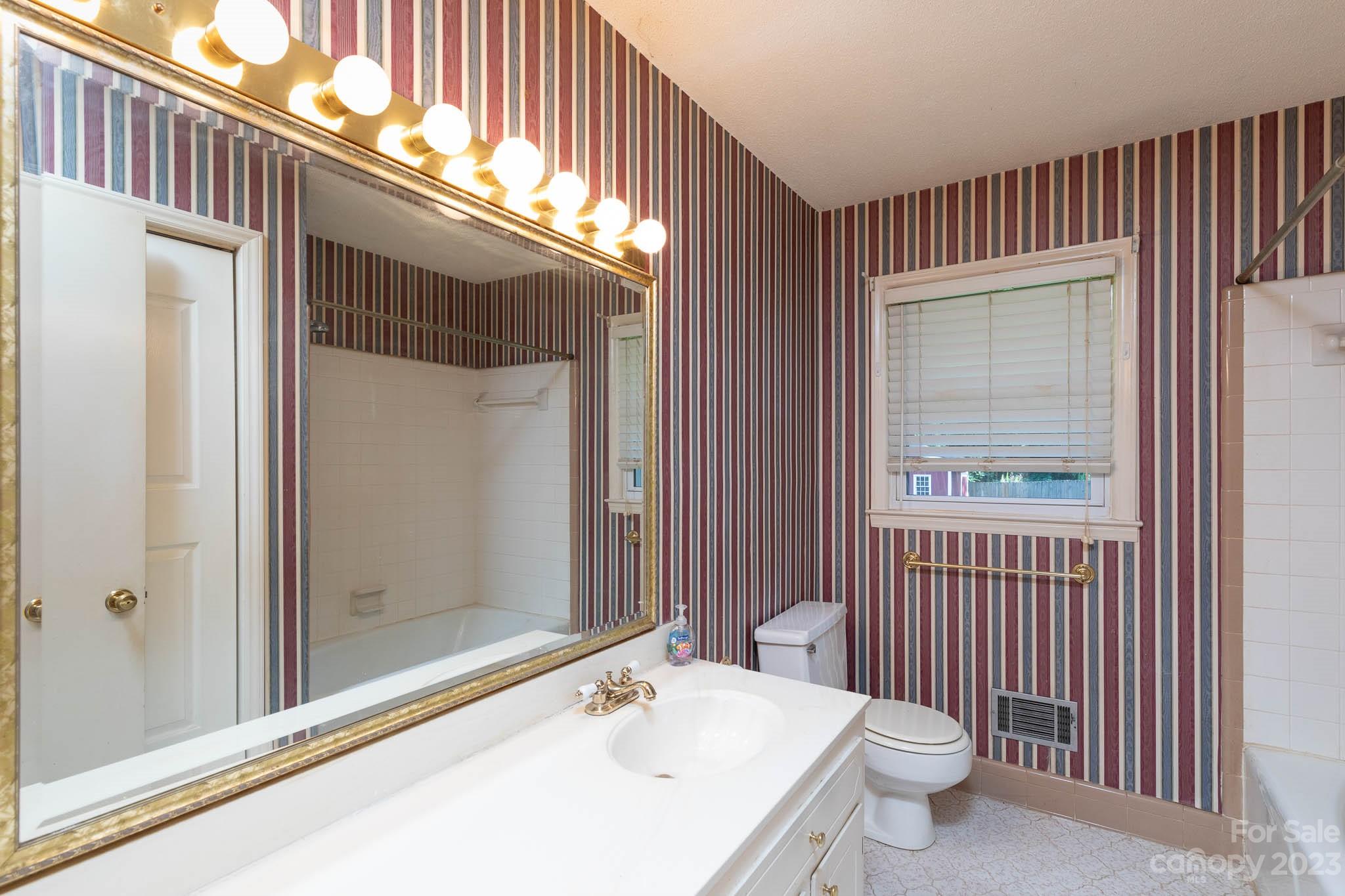 480 Plantation Road Rock Hill, SC 29732 - Photo 13 of 31 a bathroom with a sink and a mirror