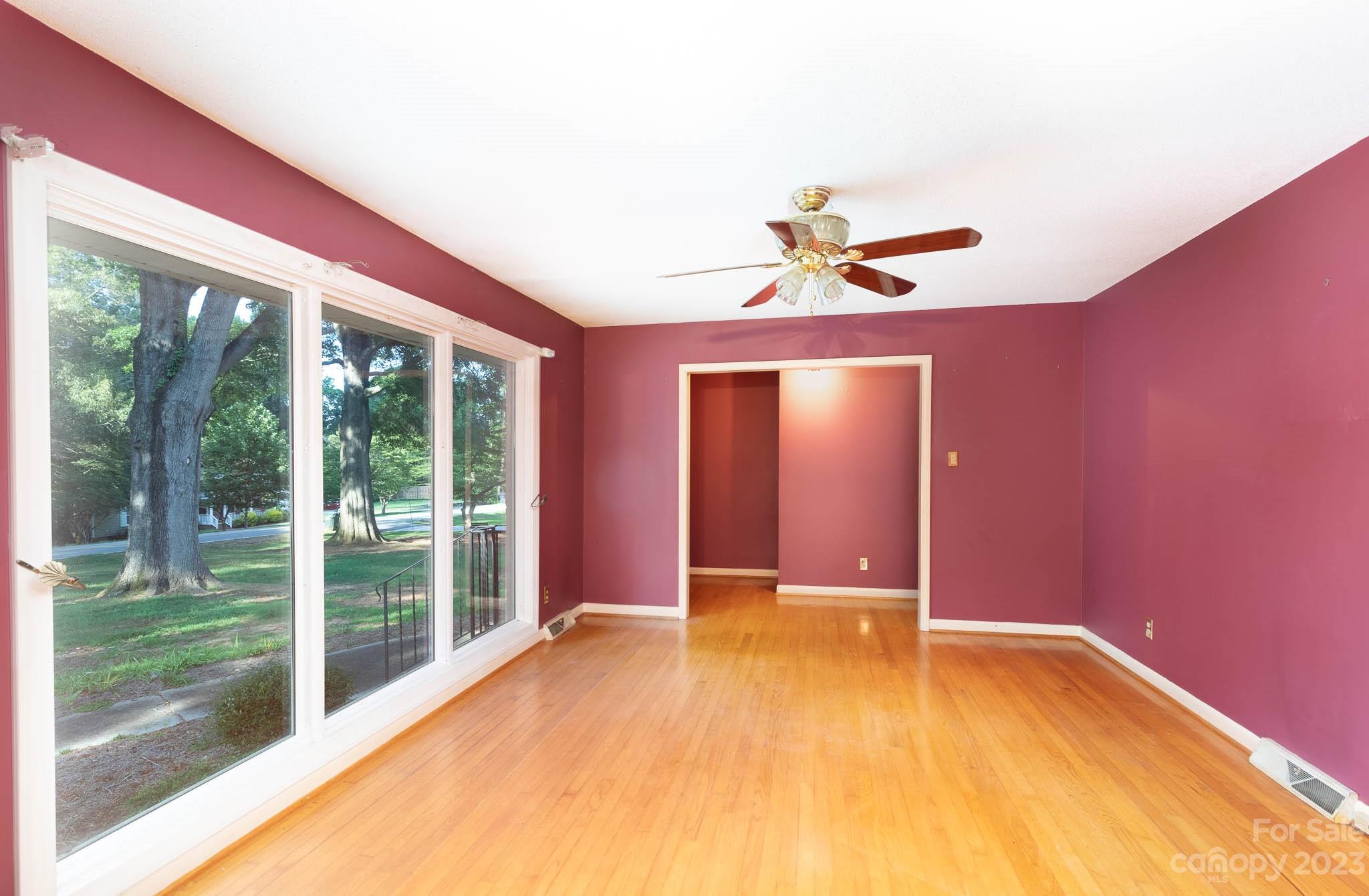 480 Plantation Road Rock Hill, SC 29732 - Photo 9 of 31 a view of a livingroom with a flat screen tv and a floor to ceiling window