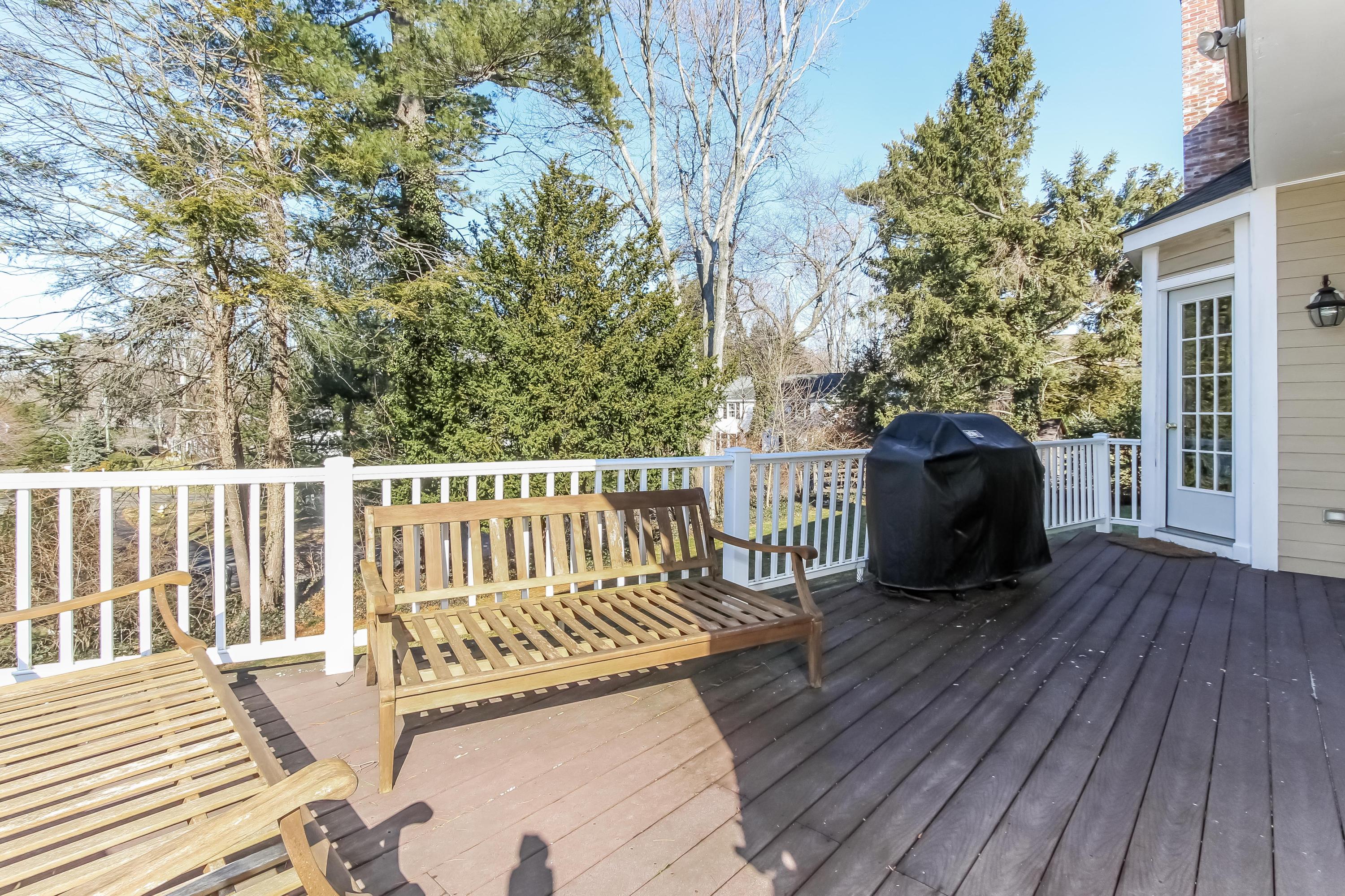 221 Hollow Tree Ridge Road Darien, CT 06820 - Photo 24 of 28 a view of deck with furniture and wooden floor