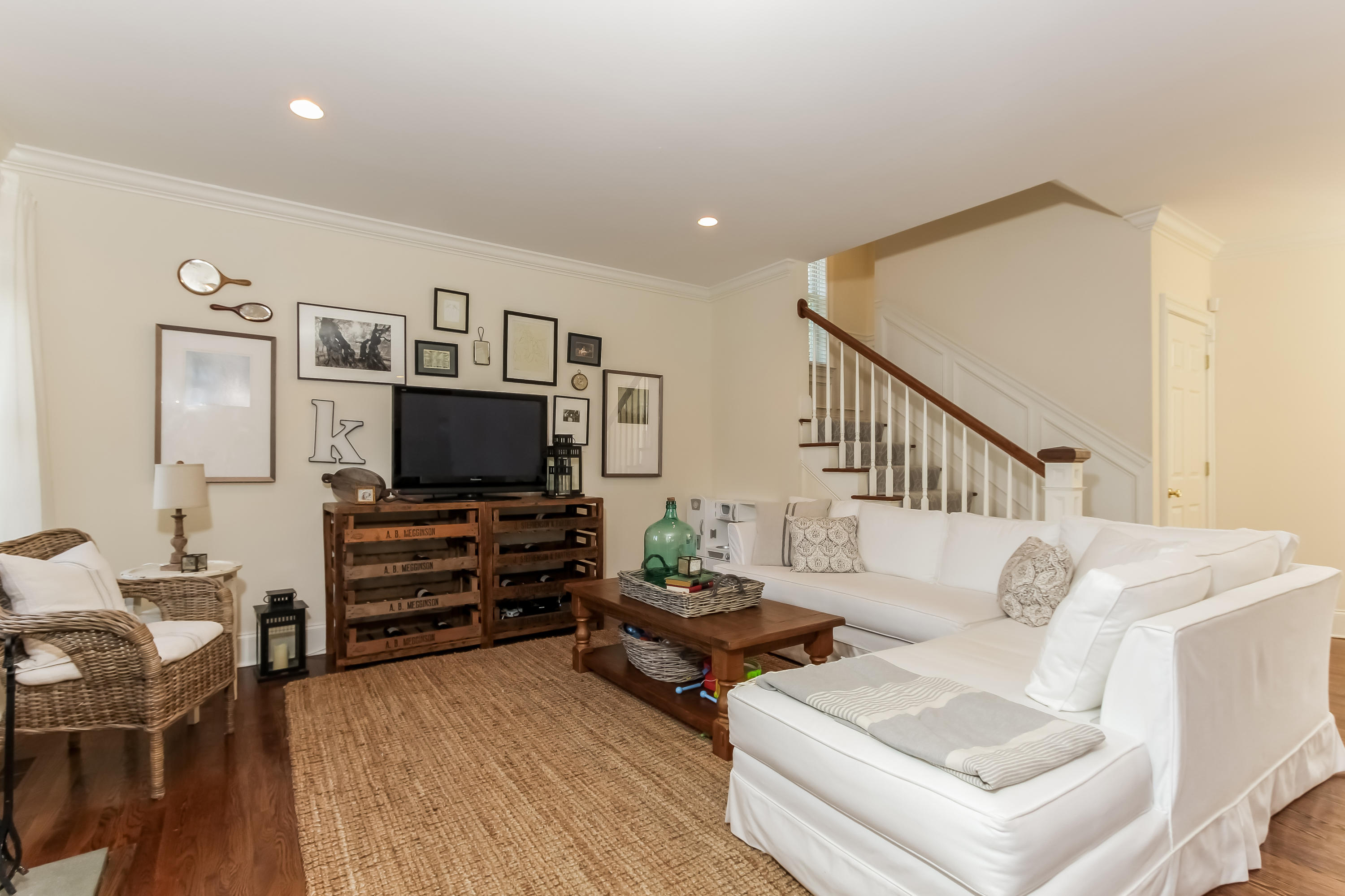 221 Hollow Tree Ridge Road Darien, CT 06820 - Photo 8 of 28 a living room with furniture and a flat screen tv