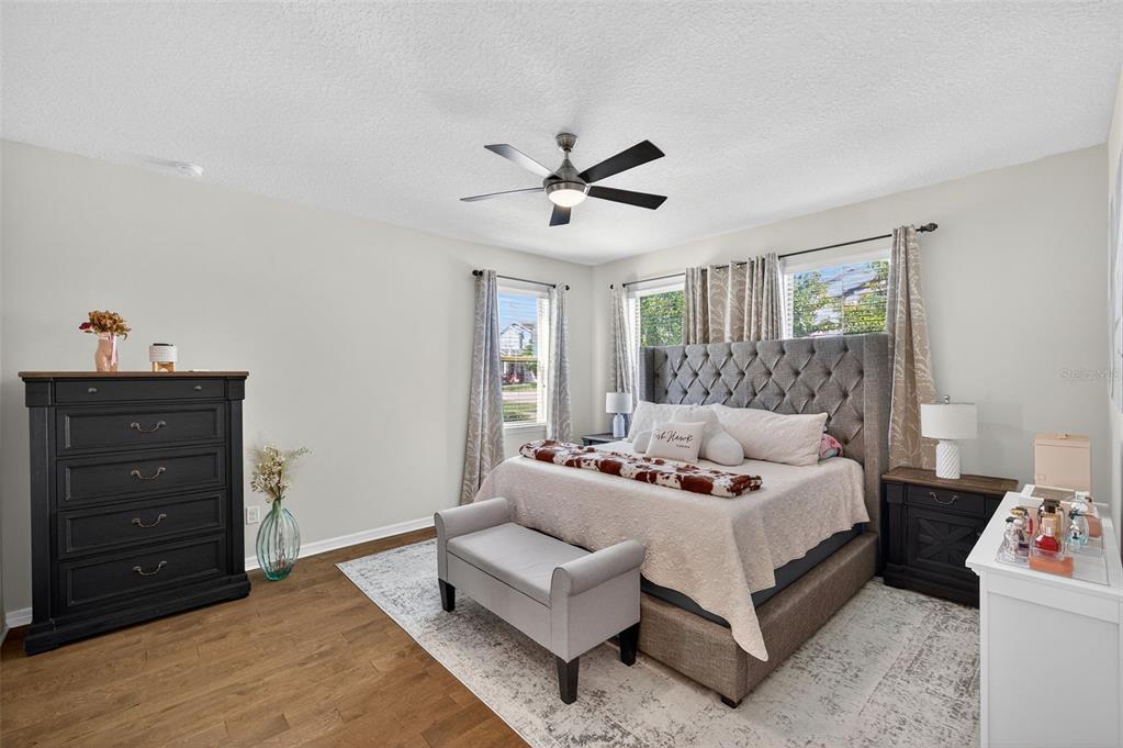 5706 Esker Falls Lane Lithia, FL 33547 - Photo 13 of 76 a living room with furniture and a dresser