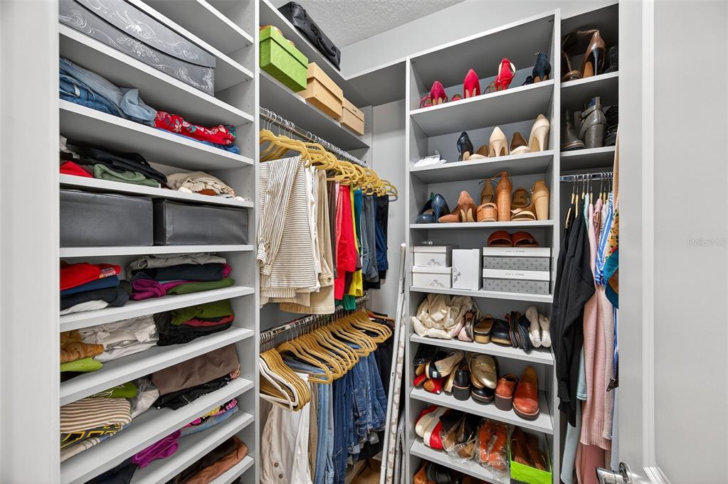 5706 Esker Falls Lane Lithia, FL 33547 - Photo 17 of 76 a view of walk in closet with clothes and shoes