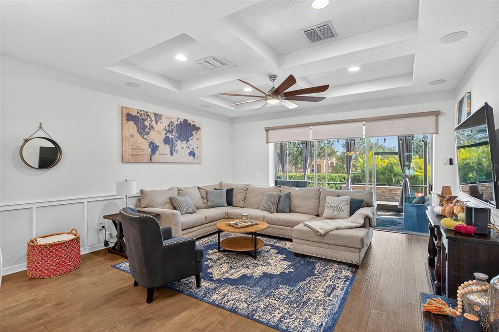 5706 Esker Falls Lane Lithia, FL 33547 - Photo 30 of 76 a living room with furniture and a large window