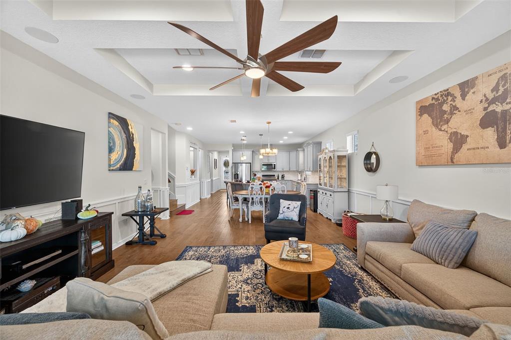 5706 Esker Falls Lane Lithia, FL 33547 - Photo 32 of 76 a living room with furniture and a flat screen tv