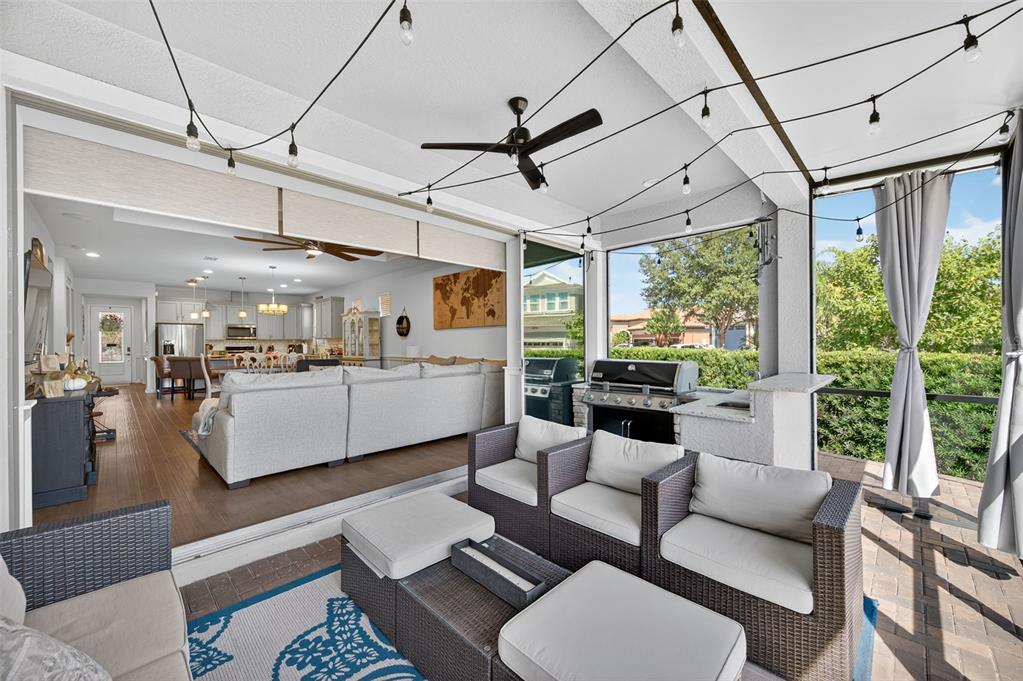 5706 Esker Falls Lane Lithia, FL 33547 - Photo 46 of 76 a living room with furniture and a large window