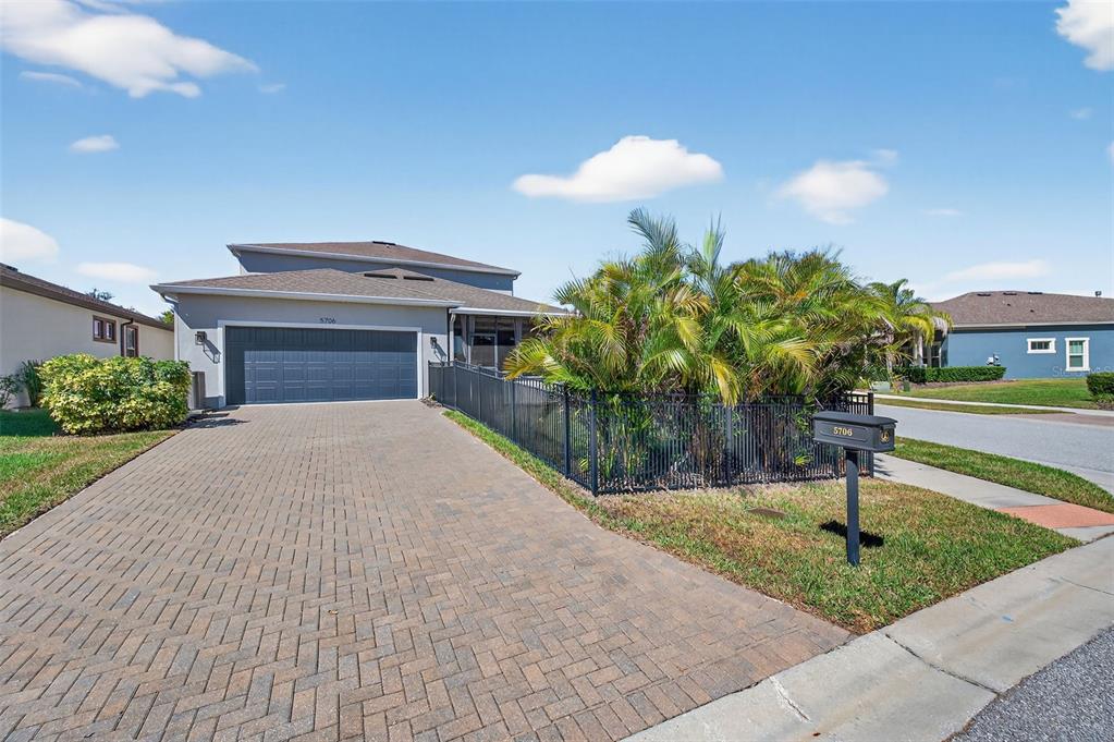 5706 Esker Falls Lane Lithia, FL 33547 - Photo 54 of 76 a house view with a garden space