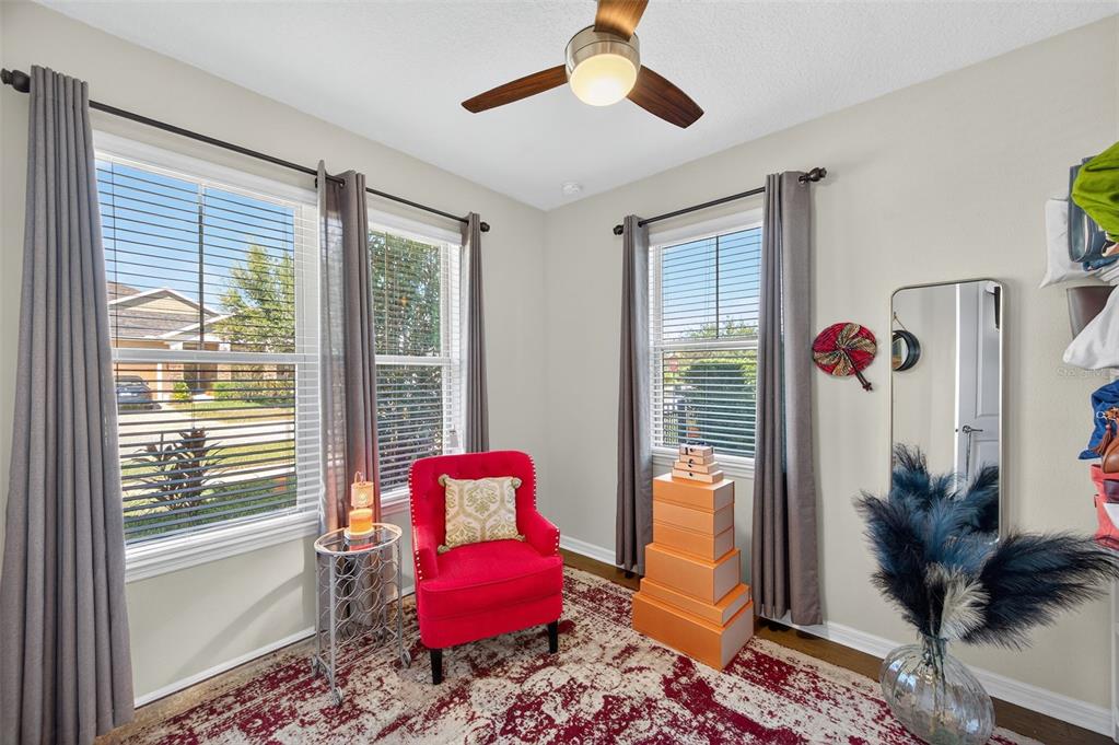5706 Esker Falls Lane Lithia, FL 33547 - Photo 7 of 76 a living room with furniture and a window