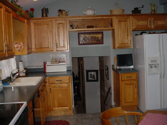 4851 Welsh Road Rockford, IL 61107 - Photo 4 of 6 a kitchen with stainless steel appliances granite countertop a refrigerator and a stove top oven
