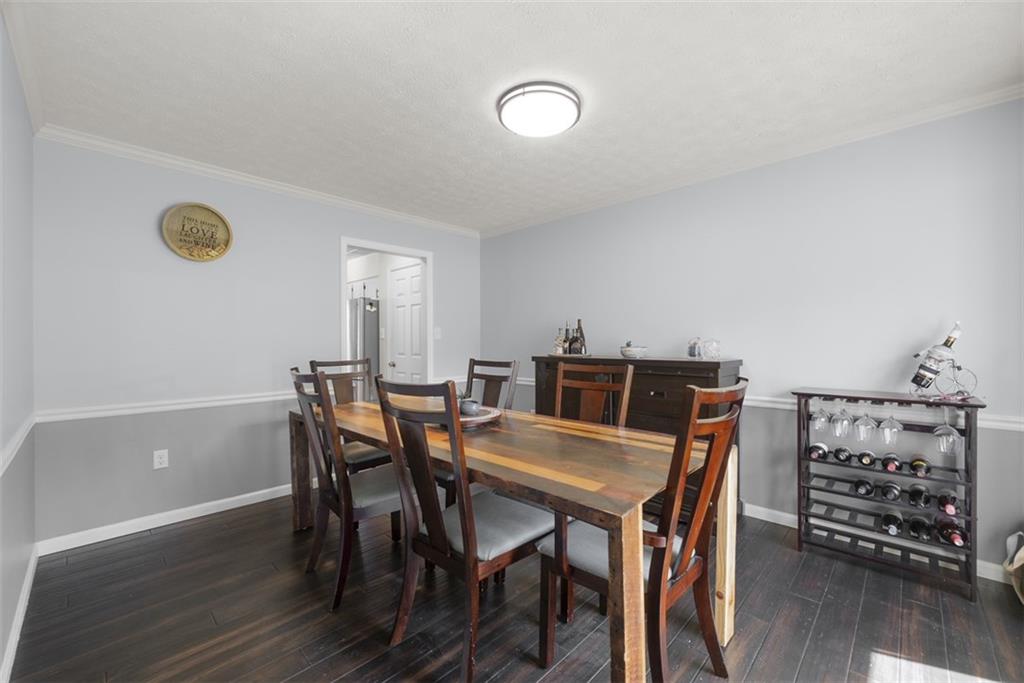 216 Briar Path Imperial, PA 15126 - Photo 15 of 39 a view of a dining room with furniture and wooden floor