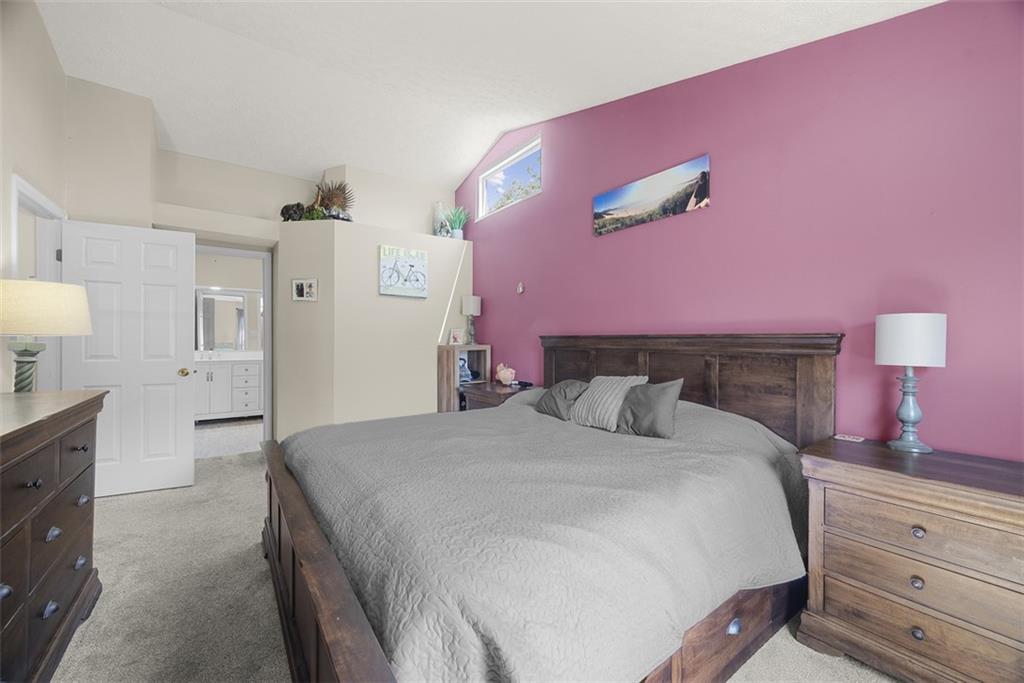 216 Briar Path Imperial, PA 15126 - Photo 20 of 39 a bedroom with a bed and a dresser in it