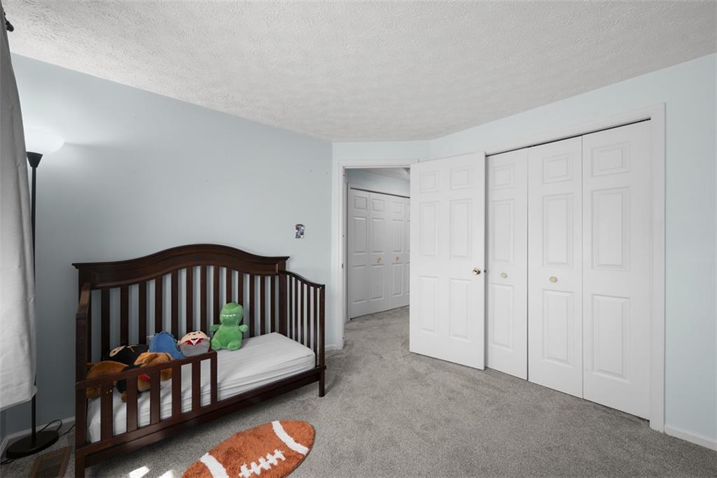 216 Briar Path Imperial, PA 15126 - Photo 24 of 39 a bedroom with furniture and a window
