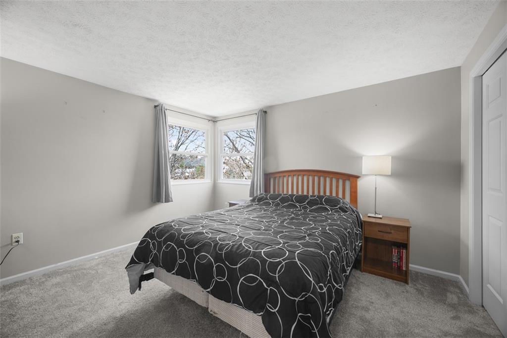216 Briar Path Imperial, PA 15126 - Photo 27 of 39 a bedroom with a bed and window