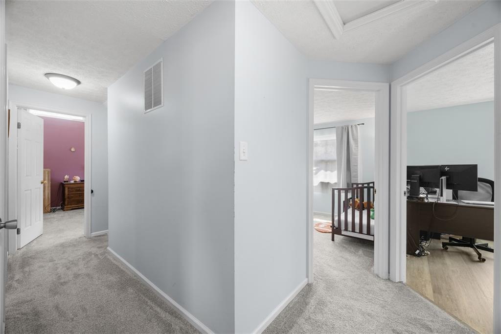 216 Briar Path Imperial, PA 15126 - Photo 29 of 39 a view of a hallway with livingroom and bedroom view