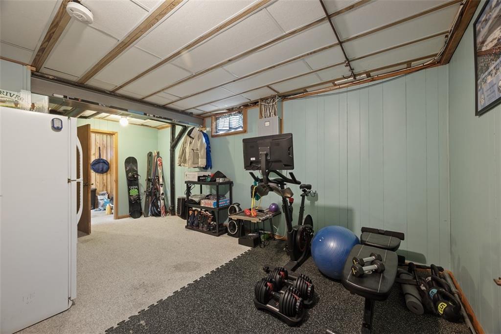 216 Briar Path Imperial, PA 15126 - Photo 31 of 39 a view of a room with gym equipment