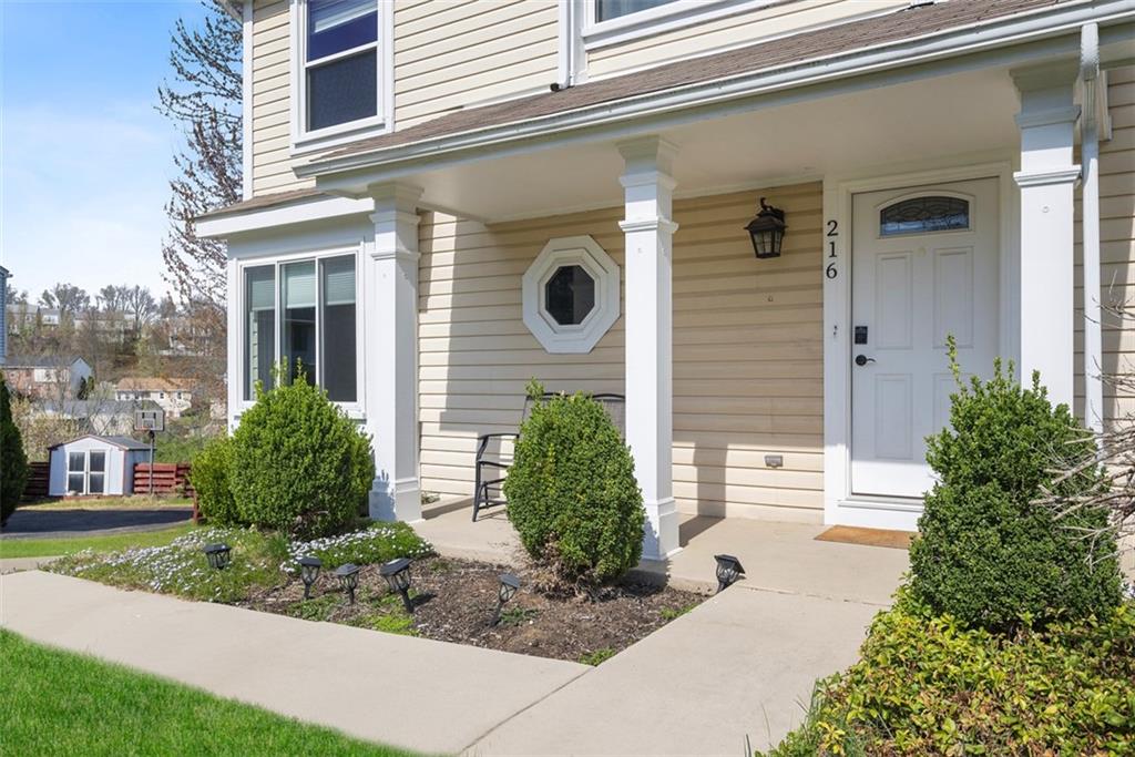 216 Briar Path Imperial, PA 15126 - Photo 4 of 39 a front view of a house with garden