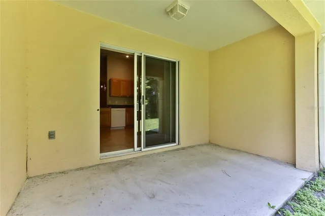 an empty room with a fireplace